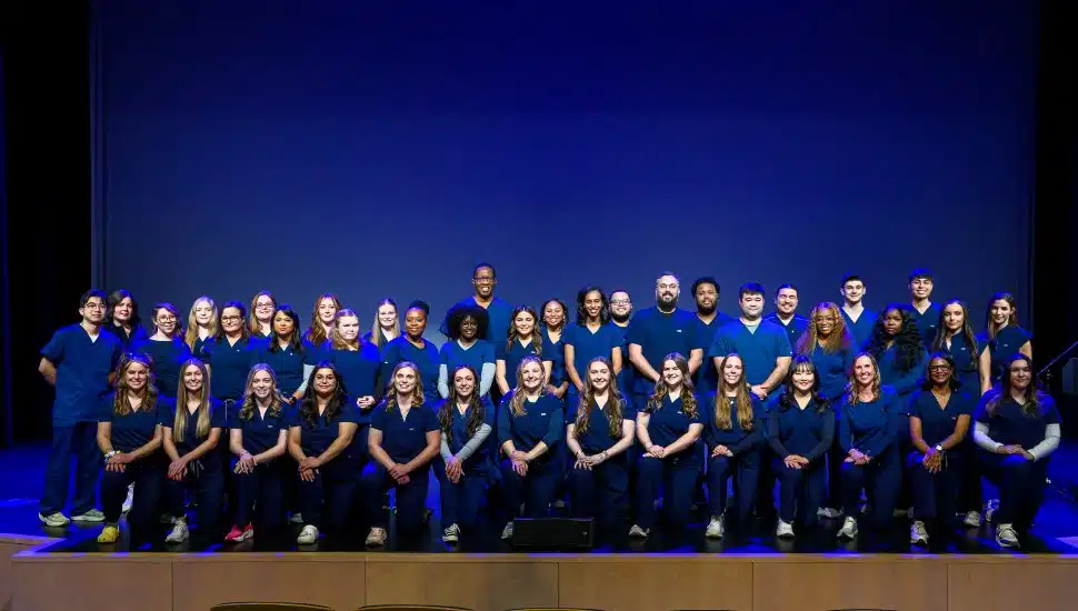 Montgomery County Community College celebrated the graduation of 41 nurses during a special pinning ceremony on the Blue Bell Campus. Nurses gathered wearing scrubs at graduation ceremony.