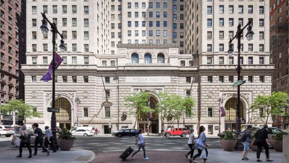People walking in both directions of the 123 S. Broad Street building in Center City.