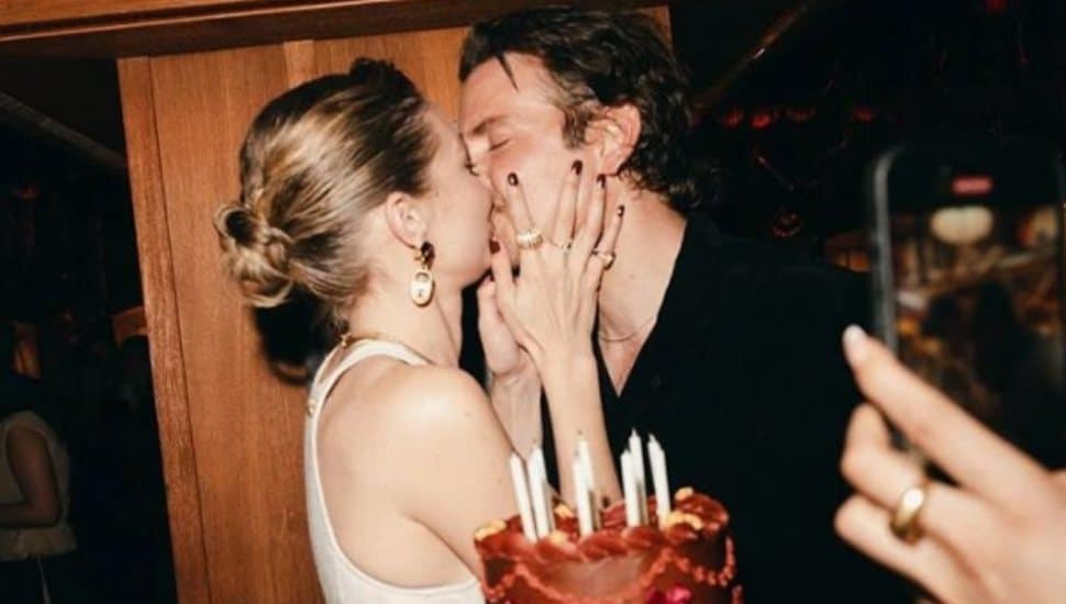 Bradley Cooper kisses girlfriend Gigi Hadid on her birthday.