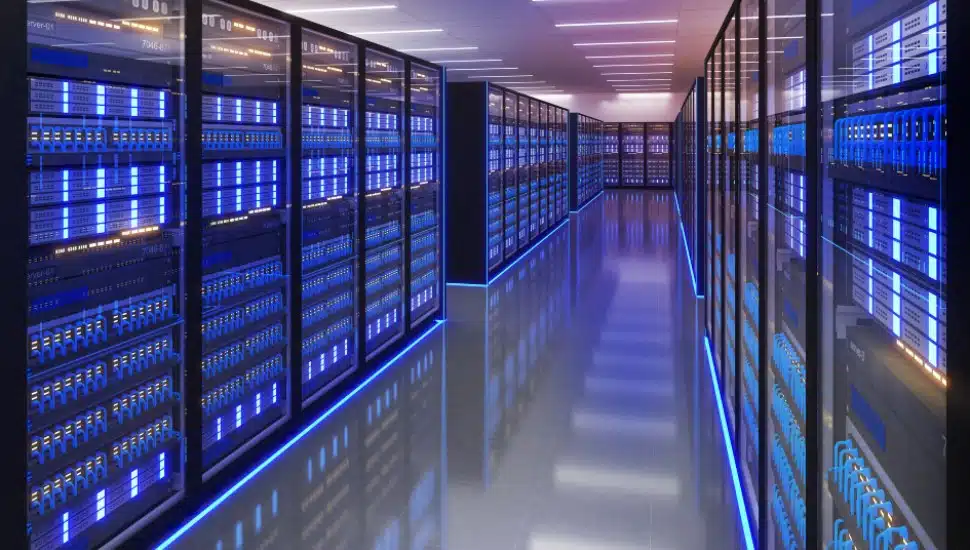 Shot of Data Center With Multiple Rows of Fully Operational Server Racks.