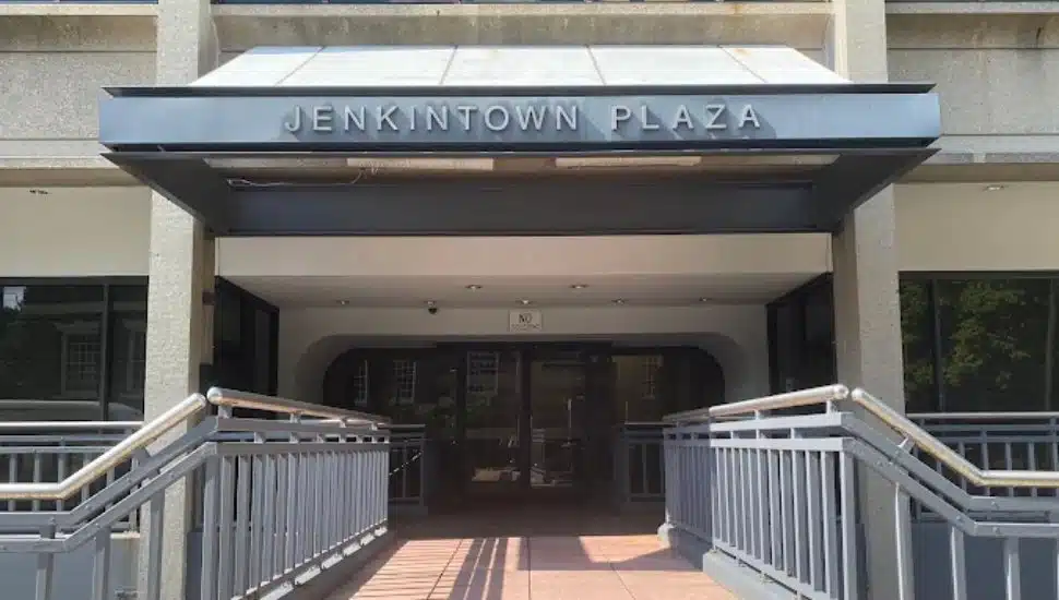 The sign above a building entrance reads Jenkintown Plaza.