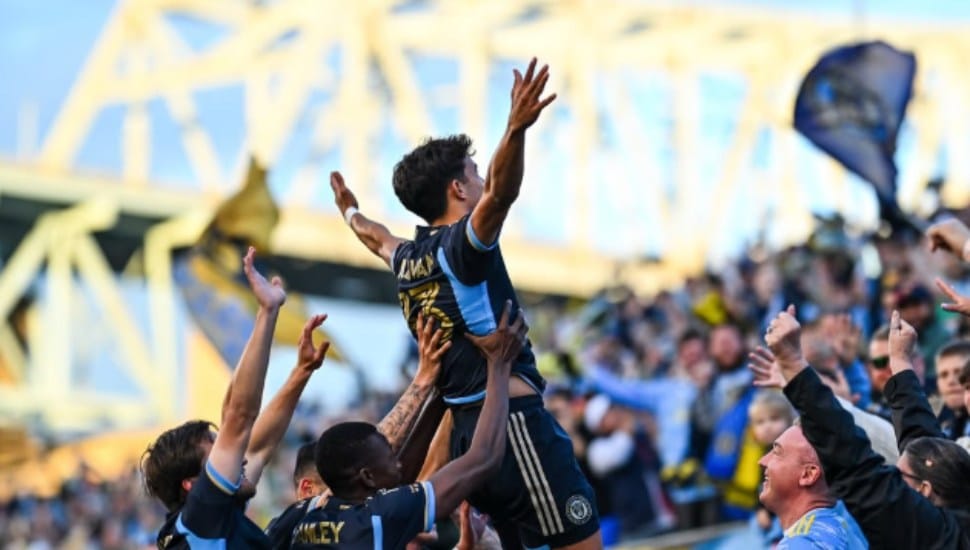 Quinn Sullivan is hoisted in the air by his Union teammates.