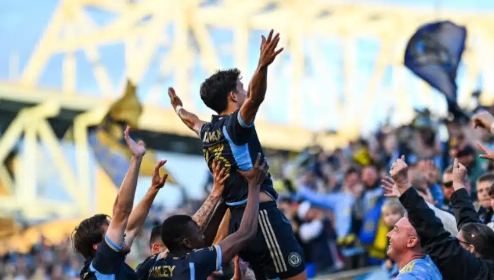 Quinn Sullivan is hoisted in the air by his Union teammates.