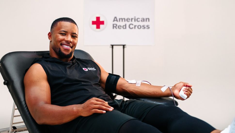 Saquon Barkley donating blood.
