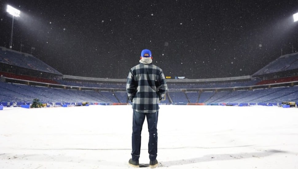 Sean McDermott stands on the snowy field in Buffalo.
