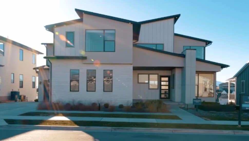 The sun shines on a Toll Brothers Fairbanks model home.