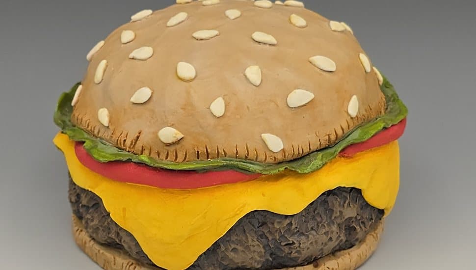 “Hamburger,” ceramics, by Eva Hozinez, 2025. Montgomery County Community College’s biennial Alumni Art Exhibition will be on display in the Montco Cultural Center Fine Arts Center Gallery on the Blue Bell Campus, Wednesday, Jan. 14- Friday, Feb.13.