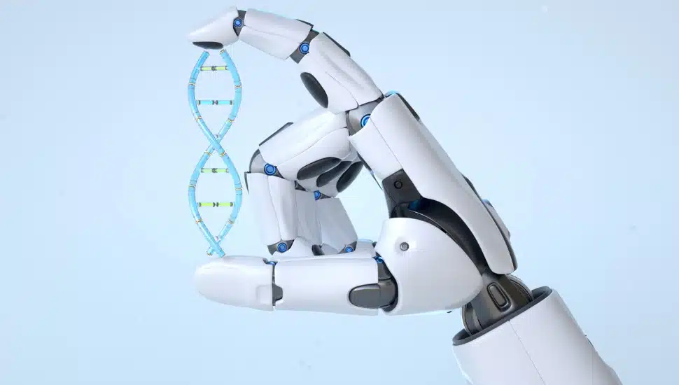 A robotic hand holds up a double helix.