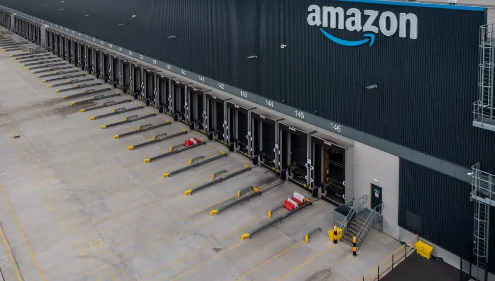 Aerial view of a the empty loading bays at a large Amazon Prime distribution warehouse.