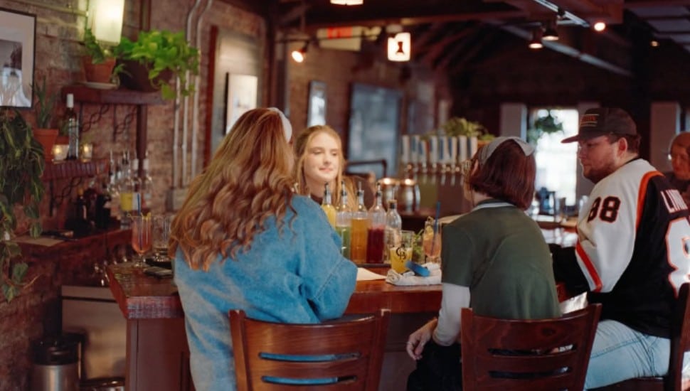 Patrons gather at the bar at Ardmore Brewing Company.