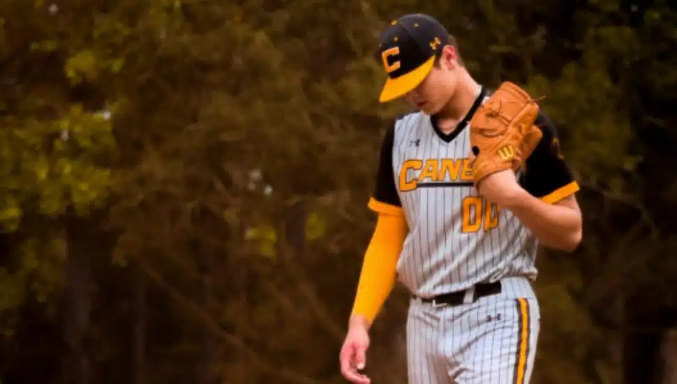 Cole Kuhn looks down from the mound.