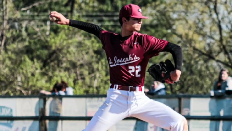 Elkins Park's Cole Kuhn throws from the mound in a game for St. Joe's Prep.