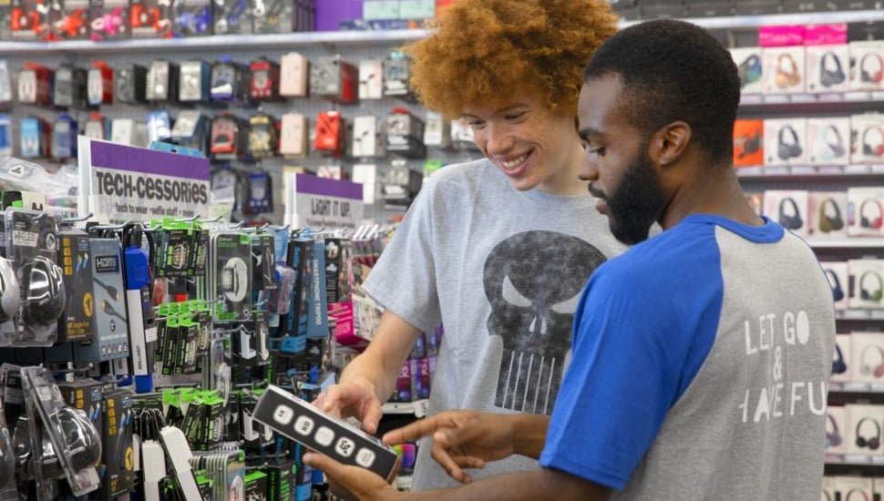A Five Blow employee with a customer.
