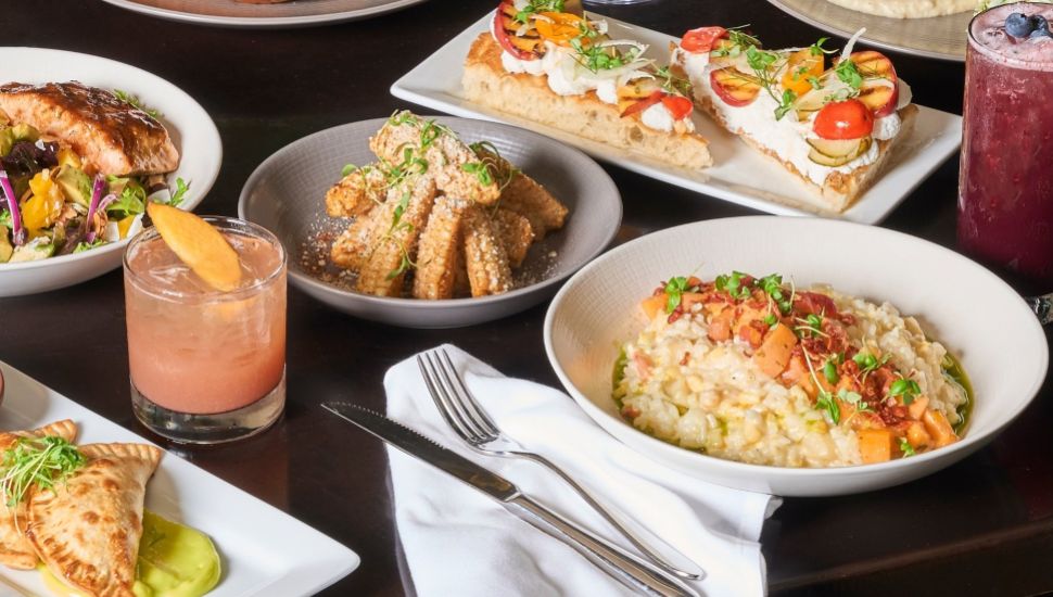 Harvest Seasonal Grill dishes on table.