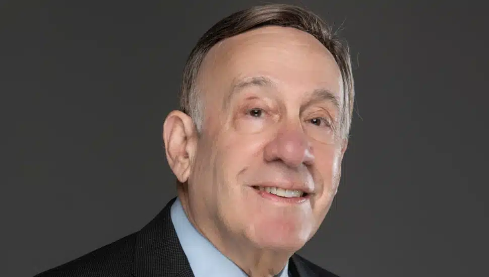 Headshot of older male attorney.