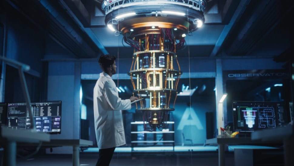 A scientist monitors a quantum computer.