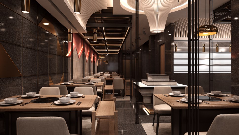 An empty restaurant dining room with moody lighting.