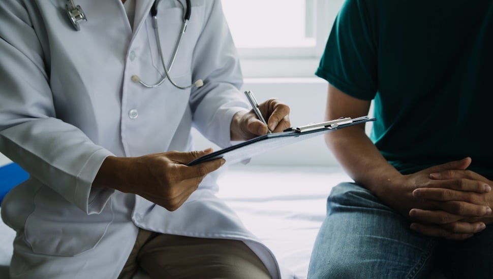 Male patient having consultation with doctor.