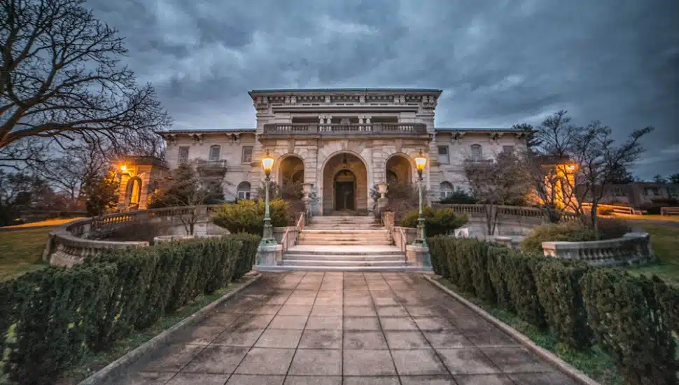 Elkins Estate in Elkins Park at dusk on a cloudy night.