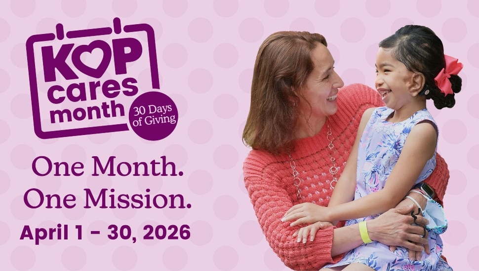 Mother hugs daughter on graphic promoting fundraiser for children's hospital.