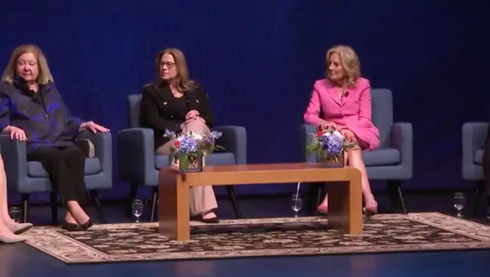 Jill Biden and Lori Shapiro sit on stage at women's event.