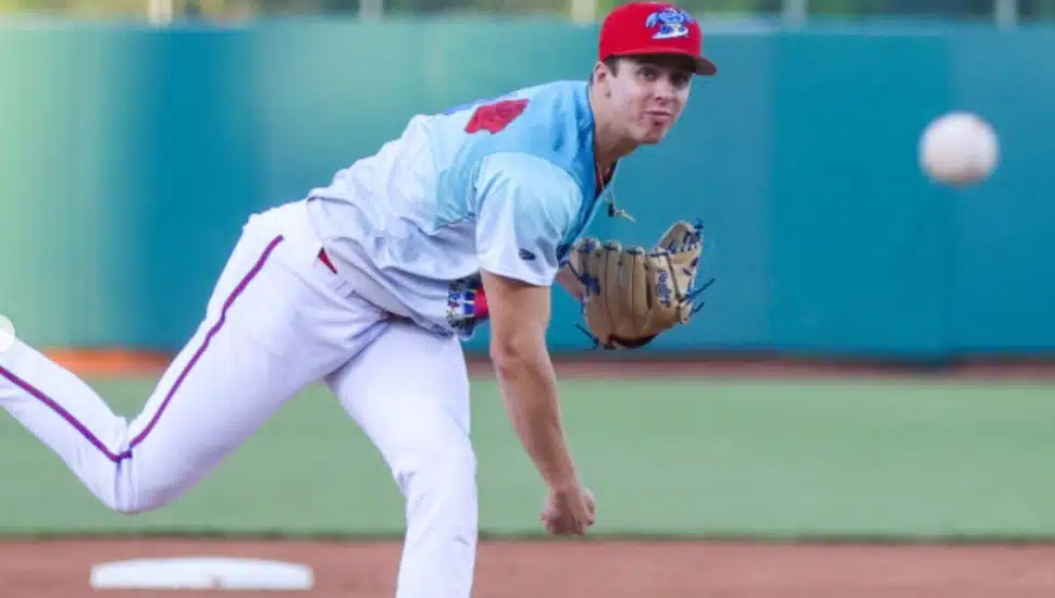 Luke Gabrysh throws a baseball from the mound.