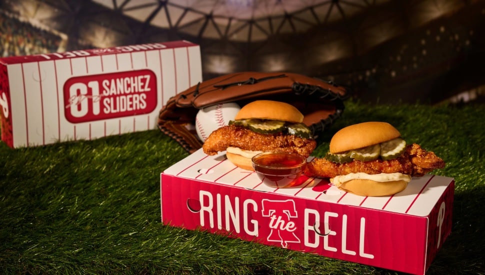 Two sliders with two honey chicken tenders tossed in a house-made hot spice blend on potato rolls with Grillo's Pickles, garlic aioli, and Mike's Hot Honey.