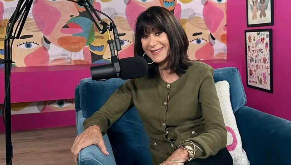 bobbi ray carter sitting in a chair with microphone near her.