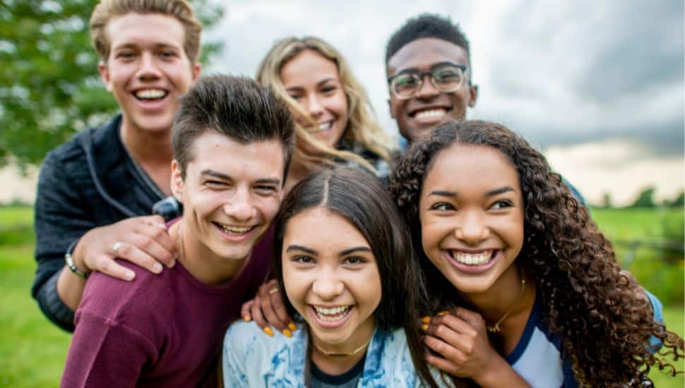 6 teens enjoying a fun moment