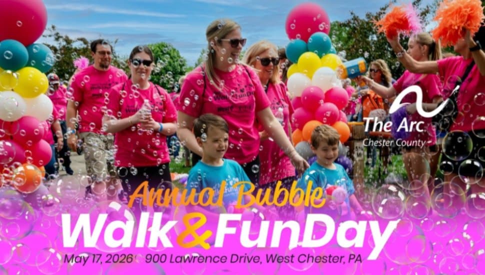 A cplorful poster showing people walking, surrounded by balloons and bubbles.