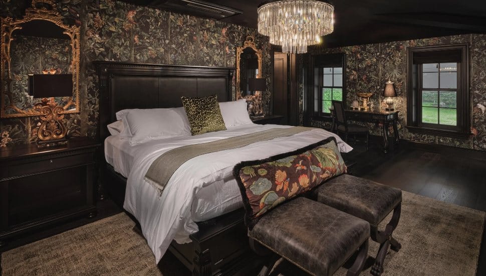 Carversville Inn guest room with bed.