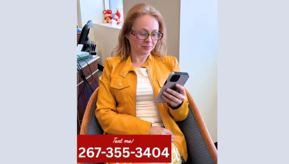 Montco Recorder of Deeds, Jeanne Sorg checks her cell phone.