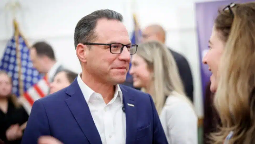 Josh Shapiro listens to a female constituent.