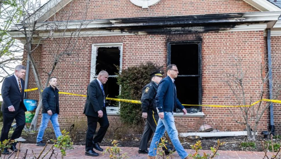 Governor Josh Shapiro walks by wreckage after arson attacks Governor's Mansion.