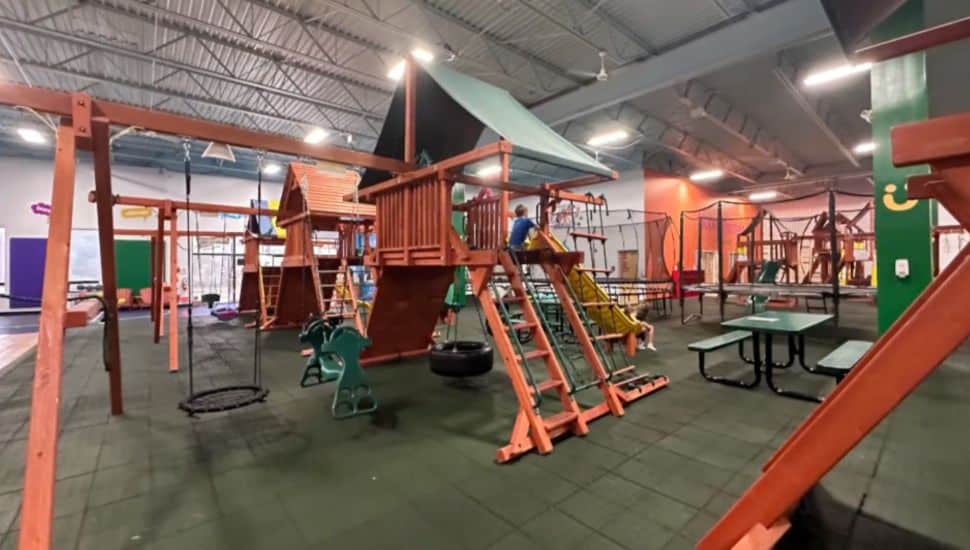 Children play in the showroom at Norristown's Superior Play Systems