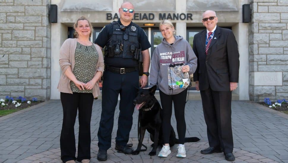 From left, Manor College Vice President of Student Affairs Allison Mootz, Officer Michael Jones, Lauren Brown, and Provost Joseph Gillespie.