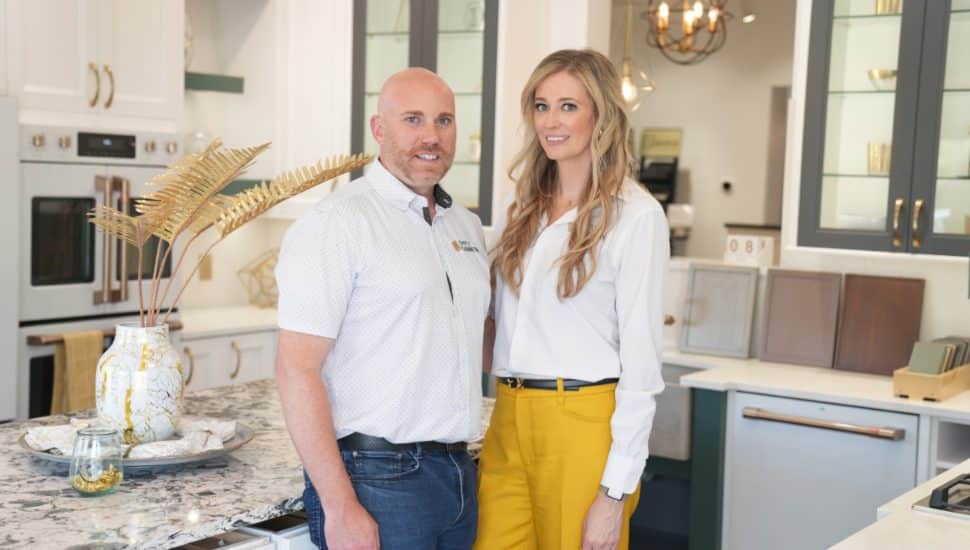 Derrick and Diana Simmons of Simply Cabinetry standing in one of their showrooms.