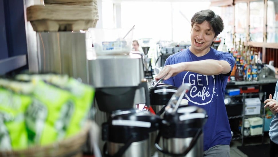 A barista prepares a drink at Get Cafe in Narberth.