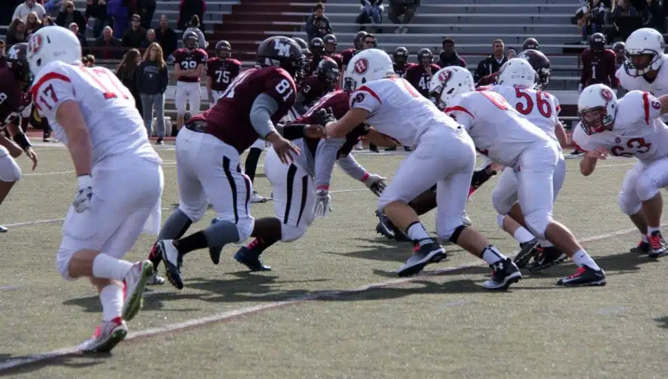 Players from Lower Merion and Harriton High Schools face off on the field in a matchup that could soon be a thing of the past.
