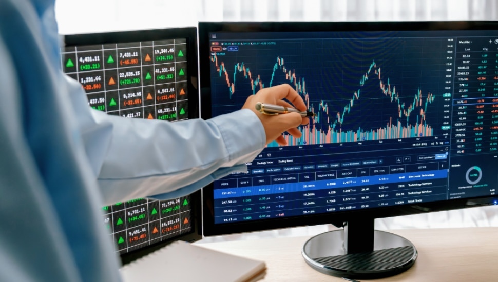 Traders monitor prediction markets.