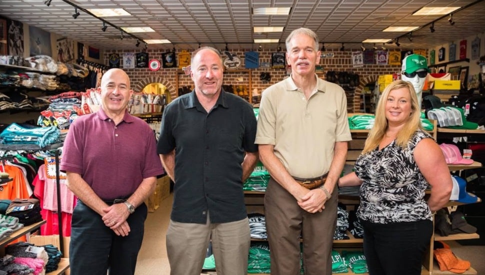 The Flocco's family inside their showroom.