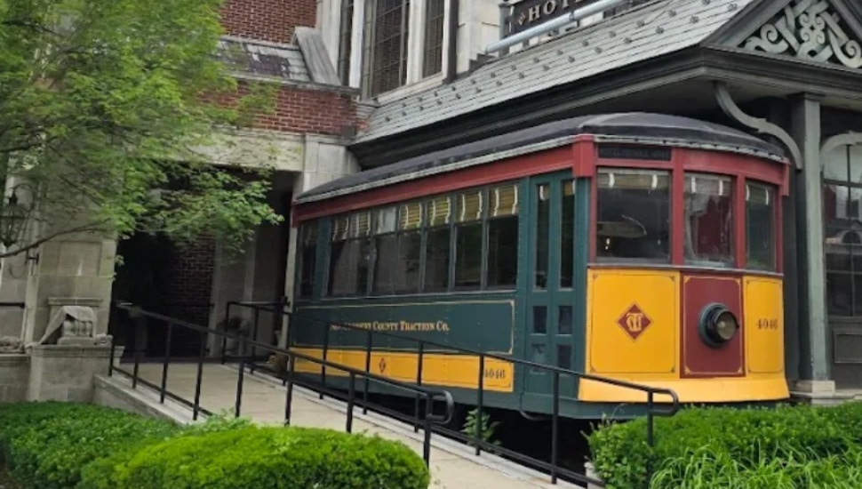 The signature trolley car sits outside of Skippack Village's Hotel Fiesole.