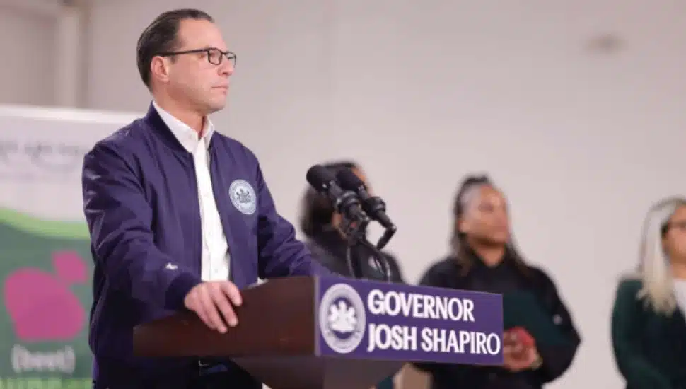 Governor Josh Shapiro speaks from a podium.